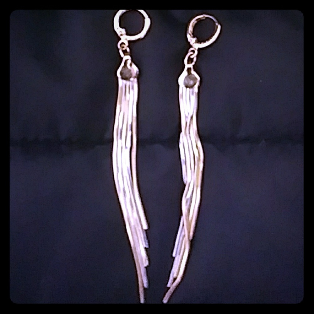Long silver and golden earrings